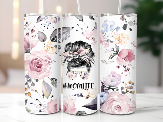 Floral background messy bun 20oz Tumbler