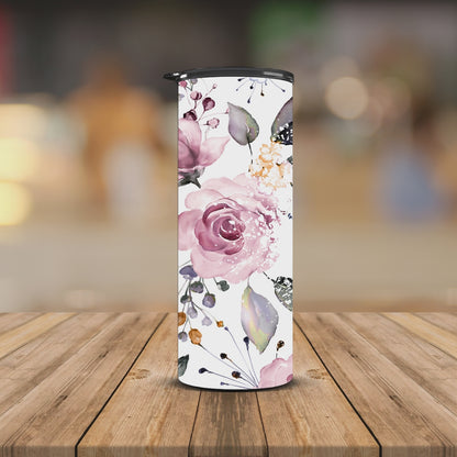 Floral background messy bun 20oz Tumbler